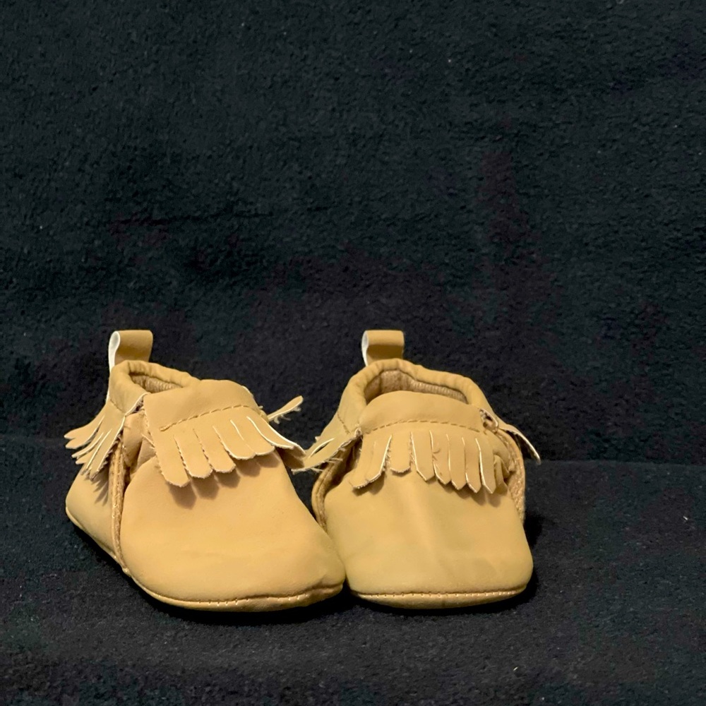 Tan baby moccasins. 0-3 months. Carter’s.